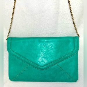 Urban Expressions Clutch Teal Good condition with a few scuffs shown in last pic